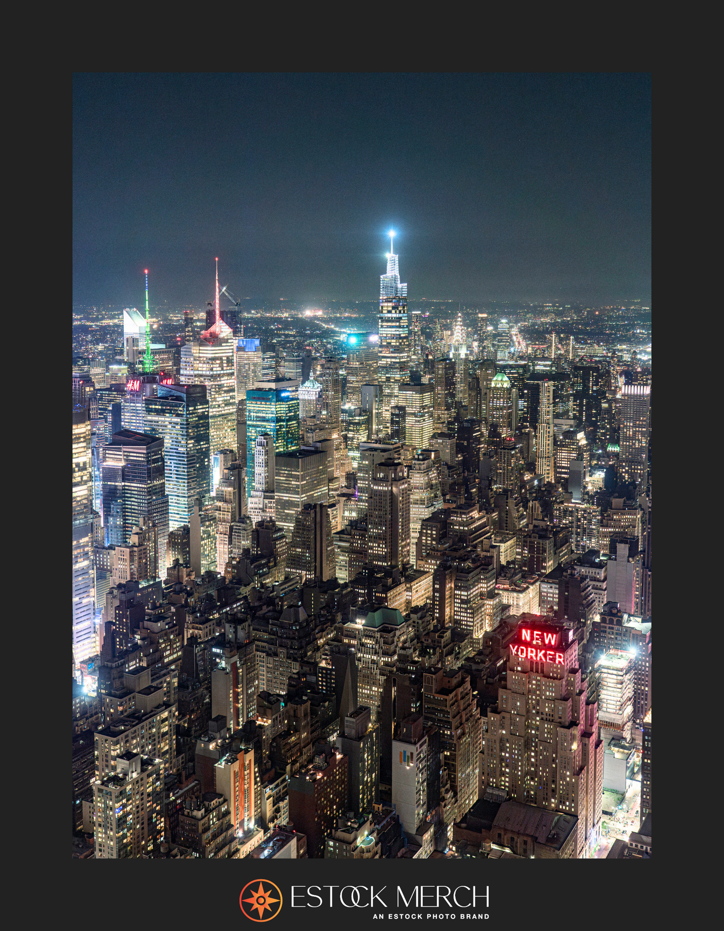 A nighttime cityscape view of Midtown Manhattan with illuminated buildings